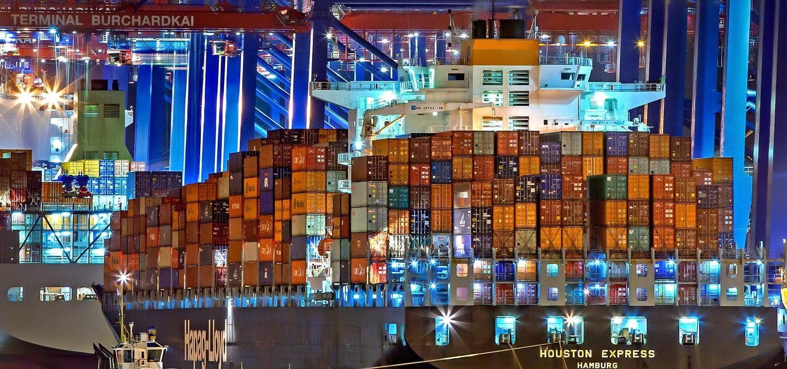 Container ship being loaded at port